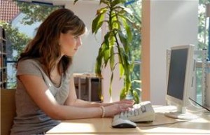 woman at computer to take a profile