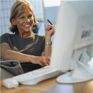 woman at computer purchase profiles online