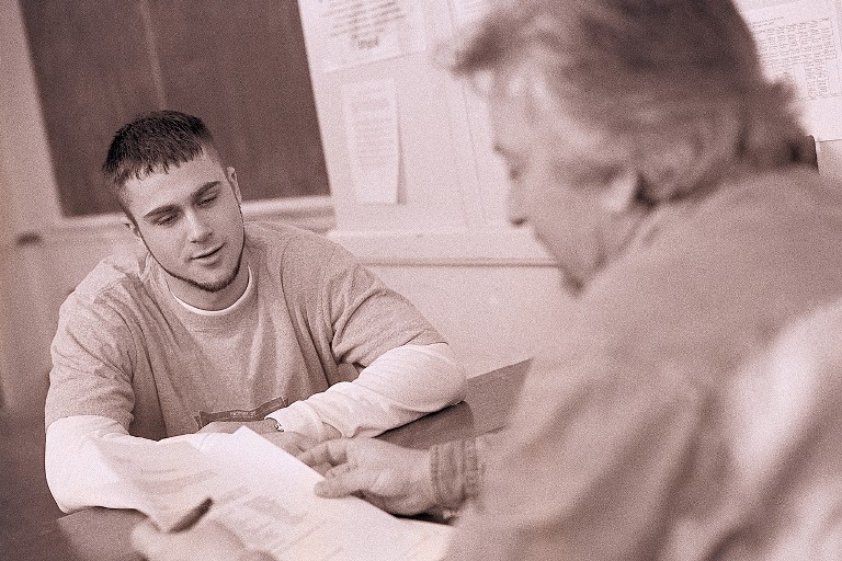 2 men counseling together with special licensing products