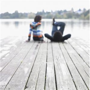 couple on a dock, talking