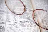 Bible with glasses