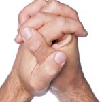 praying hands close up